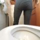 A woman is recorded from a rear perspective as she pisses and shits while sitting on a toilet. Firm, chunky shit followed by wiping. Presented in 720P HD. Over 2 minutes.